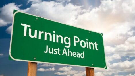 Turning point just ahead sign