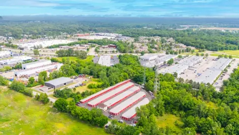 Drive up, aerial view of Devon Self Storage Units in Autumn Ridge, Memphis, TN, Drone View