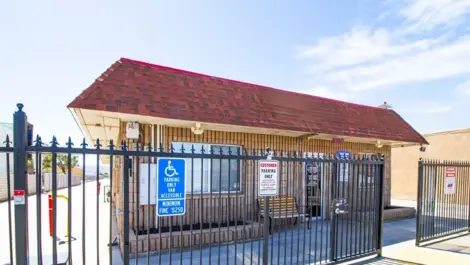 Gated access to storage facility in Apple Valley, CA, at Devon Self Storage - Highway 18 #1