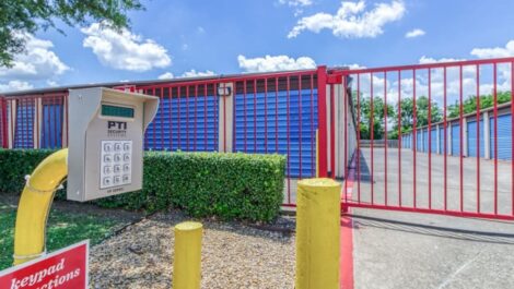 Secure access gate outside Devon Self Storage in Rowlett, Texas
