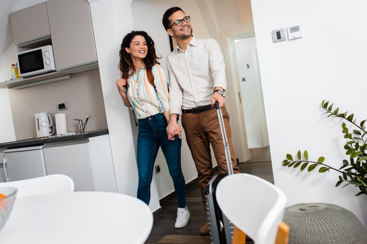 A young couple moving in together.