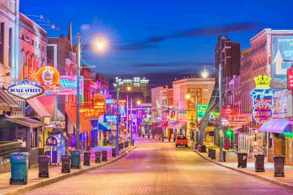 Neon lights shine brightly at night on Memphis’ famous Beale street