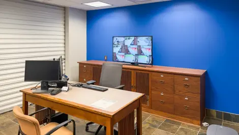 Office area at storage facility and a view of security footage in Hendersonville at Devon Self Storage - Main Street