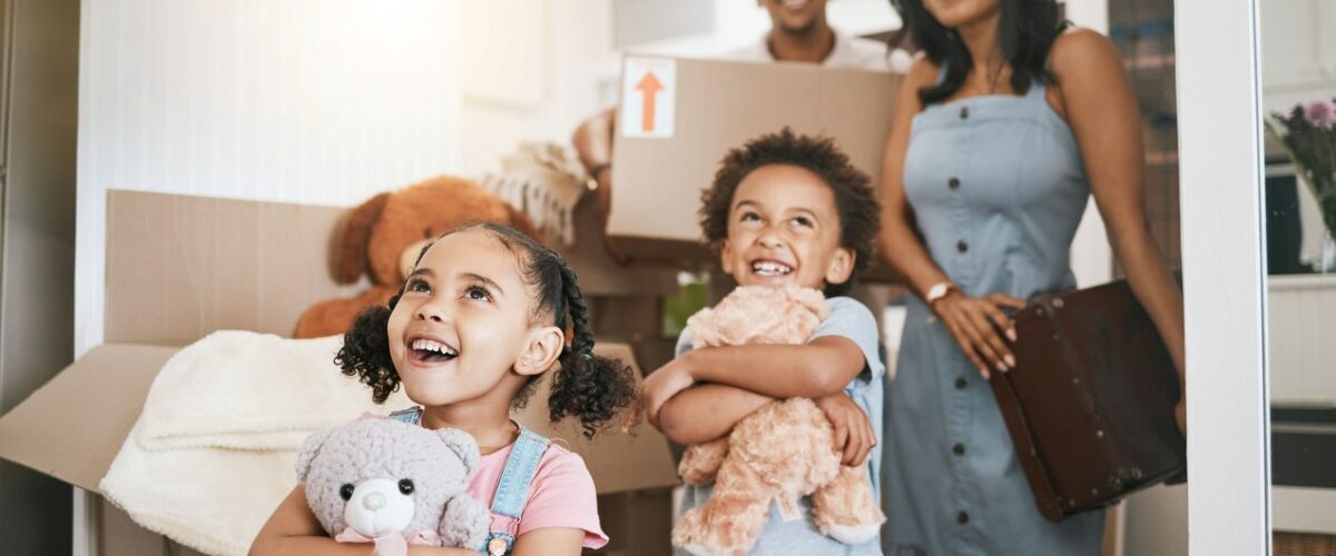 A young family with kids moves into their new home.