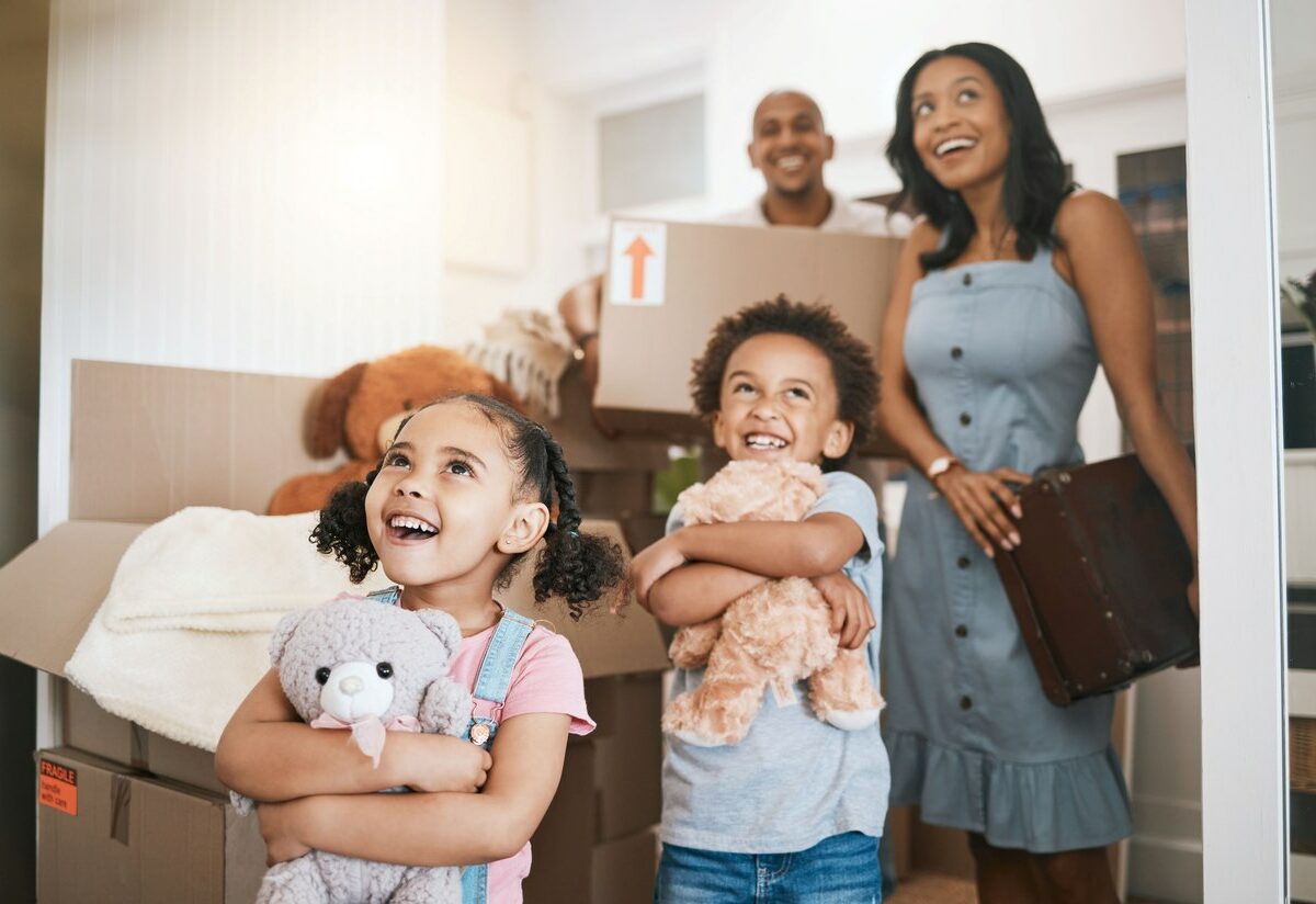 A young family with kids moves into their new home.