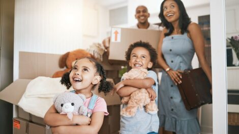 A young family with kids moves into their new home.